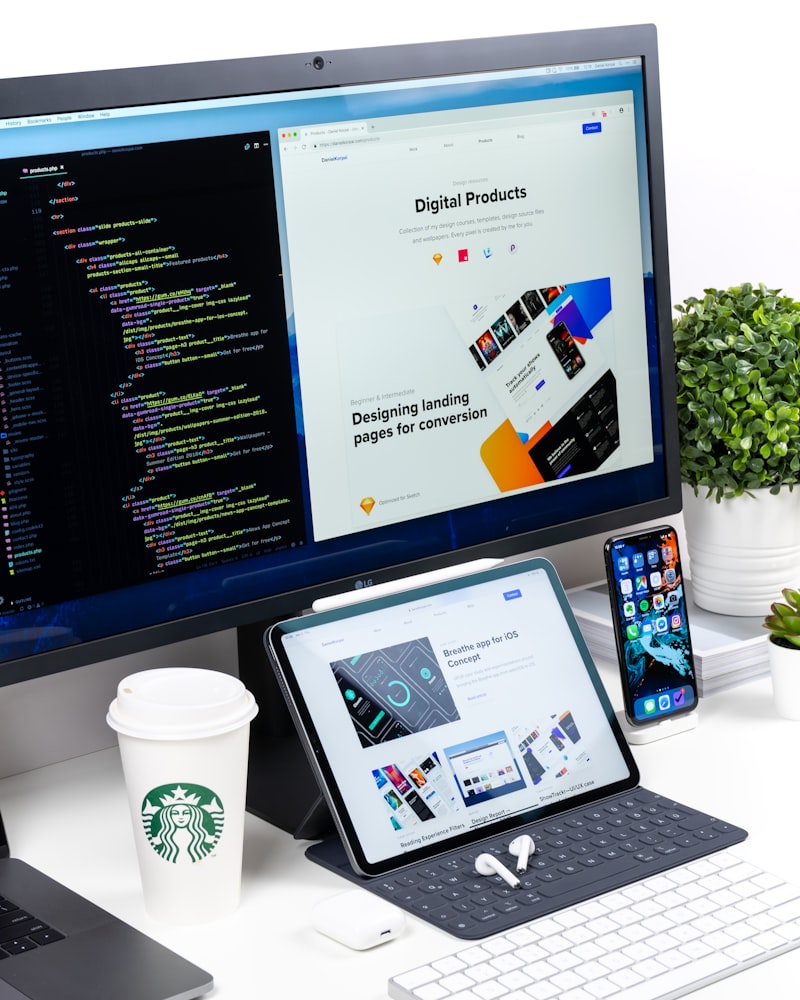 Modern workspace with laptop showing WordPress development environment